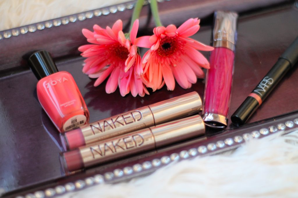 Spring makeup products including lip color and nail polish