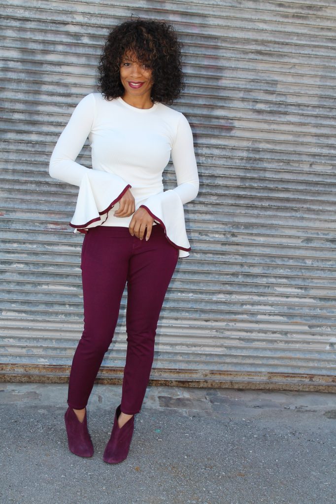 Bell-sleeve top styled as a statement-sleeve look